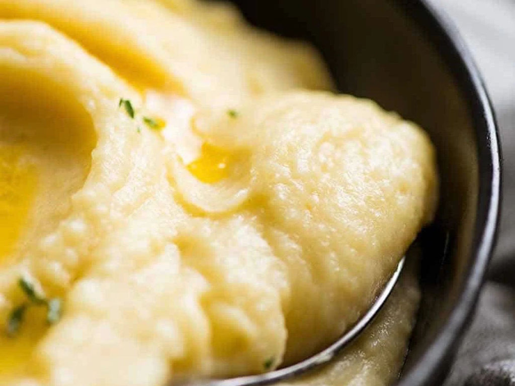 close up of creamy mashed potato in a bowl